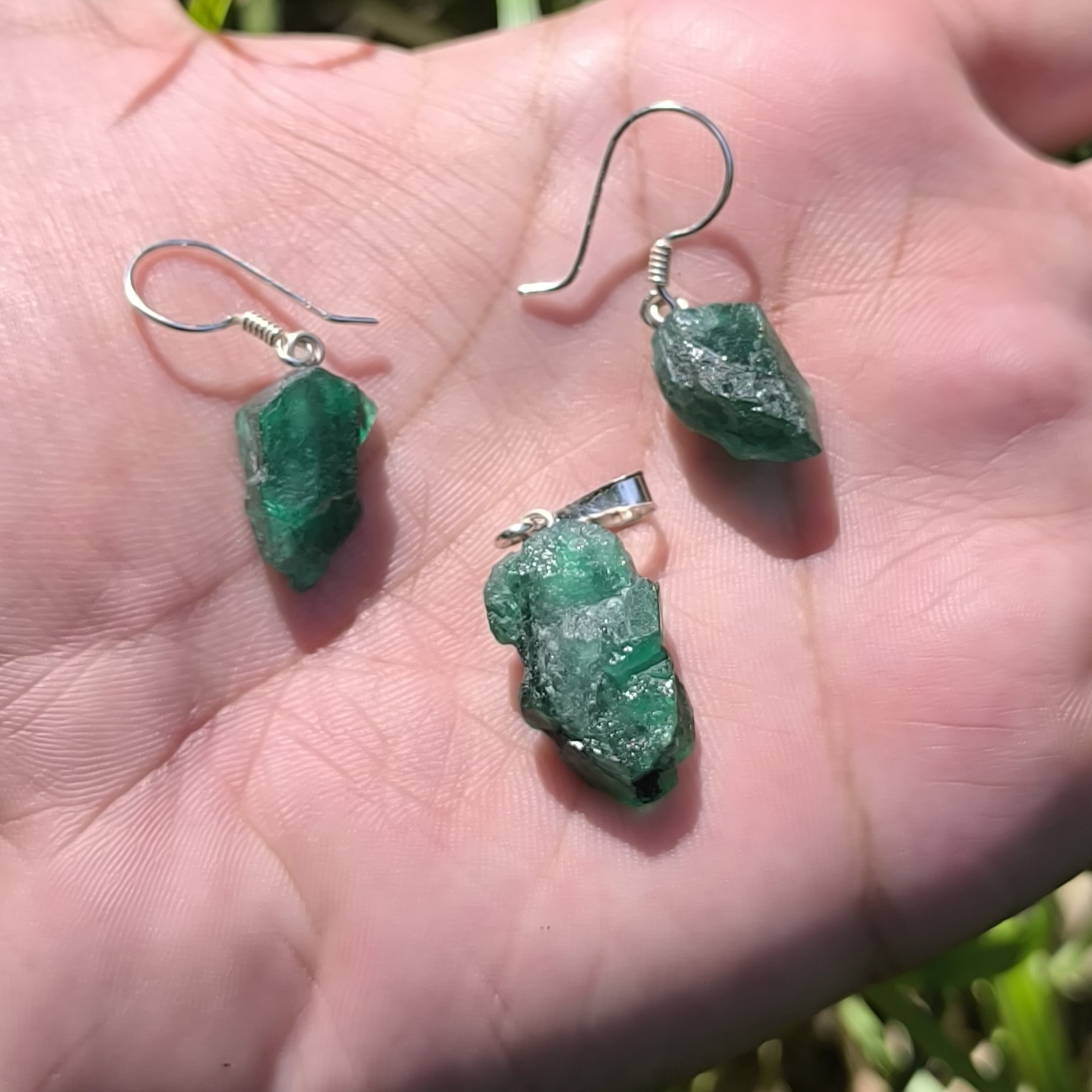 Emerald earrings and pendant set